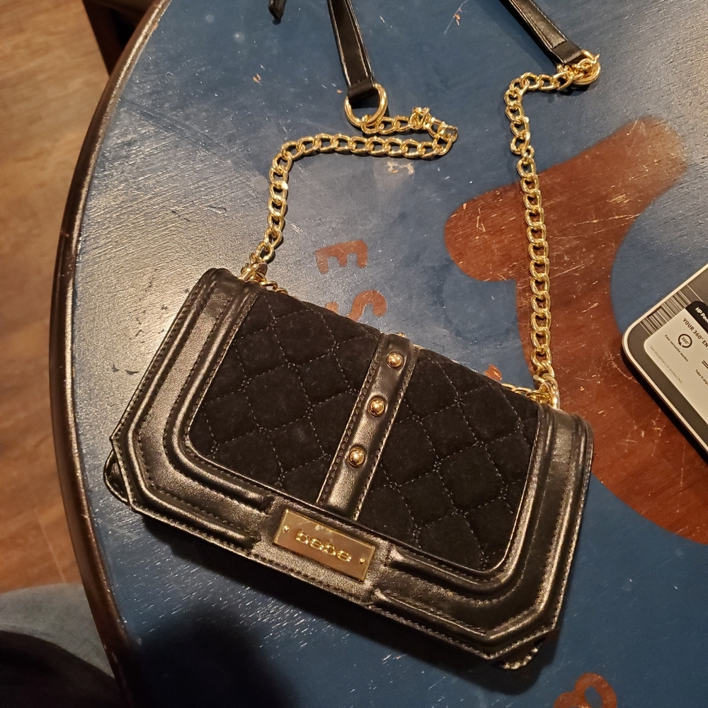 Bebe black purse with gold accents